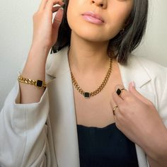 Be unique, edgy, and polished in our Nadia Chunky Chain Necklace that features a black square as the focal point amongst smooth roll of Cuban curb chain. 18K Gold Plating on Stainless Steel. Waterproof. About 15 1/2 in. + 2 in. extension Shop the matching Nadia Ring and Nadia Bracelet to complete the look. LAST CHANCE = FINAL SALE Black Metal Jewelry With Chunky Chain, Black Jewelry With Rectangular Box Chain Links, Black Chain Link Jewelry For Everyday, Everyday Black Chain Link Jewelry, Trendy Black Chain Link Jewelry, Elegant Black Chain Link Jewelry, Black Curb Chain Necklace For Everyday, Black Cuban Link Jewelry With Curb Chain, Black Chunky Chain Link Jewelry