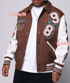 High Quality Custom Varsity Jackets , Leather Arms, Custom Print/Embroidery/Chenille patches, Unisex Baseball Varsity Jacket, American Letterman Jacket.  Available in almost all colors and Sizes.                                                      Main Features * Regular Fit * Premium Quality Wool Blend (80% wool and 20% Acrylic) * 100% High Quality Leather Sleeves. * Best Quality knitted Cotton Rib for the collar, sleeves and waistband. * 100% Polyester Quilted Lining inside the Jacket * Two Outside Slice Pockets and 2 inside pockets. * All range of wool colors * All range of leather colors * All Range of Sleeves Colors * All possibilities of trimming colors combinations * All possible Colors of Buttons & Snaps. * Custom Print/Embroidery/Chenille patches. Spring Cotton Varsity Jacket With Embroidered Graphics, Spring Embroidered Cotton Varsity Jacket, Spring Varsity Jacket With Embroidered Patch And Long Sleeve, Spring Varsity Jacket With Embroidered Patch, Winter Cotton Outerwear With Custom Embroidery, Fall Cotton Varsity Jacket With Embroidered Patch, White Embroidered Varsity Jacket For Spring, Brown Patchwork Varsity Jacket For Streetwear, White Embroidered Patch Long Sleeve Outerwear