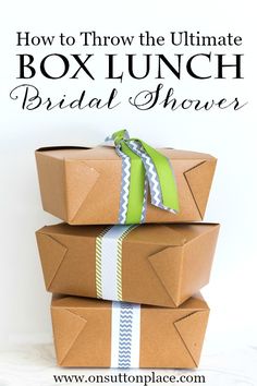 three boxes stacked on top of each other with the words how to throw the ultimate box lunch bridal shower