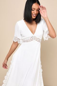 No matter the event, you'll look stunning in the Lulus Sweeten the Occasion White Lace Short Sleeve Maxi Dress! Gauzy, crinkle woven fabric shapes this splendid dress that has a deep V-neckline, flowy short sleeves, and a fitted bodice. An empire waist cascades into a maxi skirt with slits along both sides. Gorgeous sheer crochet lace accents the sleeves, waist, and sides of the skirt. Keyhole with top button closure and hidden zipper/clasp at back. Fit: This garment runs large - please size dow Chic V-neck Midi Dress With Lace Trim, Flowy V-neck Dress With Surplice Neckline For Date Night, Flowy V-neck Midi Dress With Lace Trim, Flowy V-neck Lined Maxi Dress, V-neck Dress With Lace Trim For Vacation, White V-neck Maxi Dress With Lace Trim, Lined V-neck Midi Dress For Vacation, V-neck Lace Trim Dress For Vacation, V-neck Vacation Dress With Lace Trim