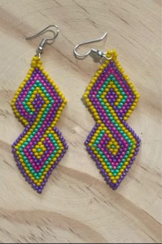 Thank you for your support. Check out Mayan Expressions on Etsy for more colors and designs. Traditional Handwoven Drop Earrings, Handmade Artisan Beaded Earrings For Festivals, Unique Handmade Beaded Earrings For Festivals, Traditional Handwoven Beaded Dangle Earrings, Yellow Handwoven Drop Earrings, Traditional Handwoven Earrings For Gifts, Traditional Yellow Handwoven Beaded Earrings, Traditional Beaded Chandelier Earrings As Gift, Traditional Chandelier Earrings With Colorful Beads As Gift