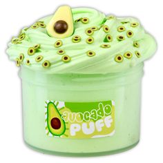 an avocado flavored cupcake with green frosting and sprinkles