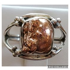 Huge Nugget! Such A Beautiful, Shiny Piece, And Great Conversation Starter! Raw, Natural, Mined Copper Ore Set In 925 Stamped Sterling Silver. Please See All Pictures For Details And Measurement. Brand New. Never Worn. Wholesale Prices Always....Or Less *****Copper Prices Are Rising Just Like Gold And Silver!!! Formal Fusion Rings With Polished Finish, Sterling Silver Ring With Shiny Finish, Elegant Sterling Silver Nugget Jewelry, Polished Finish Rose Gold Sterling Silver Rings, Polished Rose Gold Sterling Silver Rings, Hand Forged Nugget Jewelry As Gift, Rose Gold Sterling Silver Rings With Polished Finish, Unique High Luster Jewelry For Formal Occasions, Classic Hallmarked Nugget Jewelry