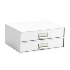 a white box with two drawers on it