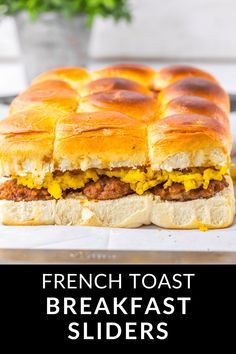 a close up of a sandwich on a plate with the words french toast breakfast sliders