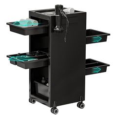 a black cart with three drawers and two green trays on it's wheels