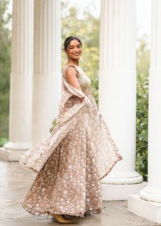 Let's hear it for our new pant and cape set, Adira! Featuring an olive green sharara pant and cape with a garden print on a flowy georgette base. It's paired with a matching olive green blouse with all-over delicate gold thread work and sequin embroidery. Style this pastel pant and cape set for a garden party or destination wedding! Blouse, pants, and cape included. Indian Sharara, Sharara Design, Green Sharara, Pastel Pants, Sharara Designs, Cape Set, Sharara Pants, Olive Green Blouse, Green Sleeveless Blouse