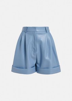 Transform your wardrobe with the Essentiel Antwerp Falcons Faux Leather Shorts in Feeling Blue. The butter-soft faux leather material adds a touch of luxury, while the pleated front detailing and fixed folded hem add a sophisticated touch. With two welt pockets at the back and slanted front pockets, these high-waisted shorts are both practical and fashionable. Elevate any outfit with these versatile and polished shorts. Fabrication: 100% Polyurethane, base 100% Recycled Polyester, lining 100% Le Chic High Waist Leather Shorts, Chic High-waist Leather Shorts, Leather Shorts With Belt Loops For Spring, Trendy Leather Shorts For Workwear, Spring Leather Shorts With Belt Loops, Chic Leather Shorts With Pockets, Faux Leather Shorts With Belt Loops For Summer, Summer Faux Leather Shorts With Belt Loops, Spring High-waisted Leather Shorts