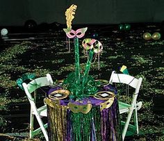 a table set up for a mardi gras party