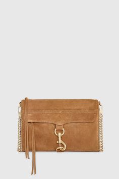 The MA. C. crossbody is the perfect mix of sophistication and function. Its sleek silhouette and gold accents make it a stunning choice for both casual and formal occasions. Style # CH24IMCXBMD-CAMEL 100% Suede Leather Light Gold Hardware 11. 25" W X 7. 75" H X 1. 5" D 22" Strap Drop Zip Closure 1 Interior Zipper Pocket + Phone Pocket Khaki Polyester Lining Imported The photos featuring a model are for size reference only. Actual color and material may vary from what is depicted. | Rebecca Minkoff M.A.C. Bag In Camel Wicked Clothing, Leather Outerwear, Suede Fashion, Leather Dresses, Rebecca Minkoff Mac, Boots For Sale, Clutch Handbag, Handbag Accessories, Gold Accents