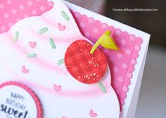 a close up of a birthday card with a piece of cake on the front and side