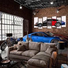 a living room filled with furniture and lots of windows next to a blue sports car