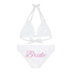 This two piece swimsuit is perfect for your Bachelorette party or vaca! Perfect gift for your bride-to-be!!  Match with your Bridesmaids PLEASE NOTE Due to health reasons,  we DO NOT accept returns or exchanges on swimwear!!  nMade with 4-way stretch Tricot (82% Microfiber, 18% Spandex), this strappy bikini set is the perfect companion to all summer escapades. With adjustable elastic straps for a perfect fit, this complete two-piece swimsuit needs your custom art to become an instant summer hit.  .: Material: 82% microfiber polyester, 18% spandex .: Medium fabric (7.5 oz /yd² (250 g/m .: Two piece swimsuit .: 7 strap colors to choose from .: Adjustable elastic straps .: Removable cups .: Assembled in the USA from globally sourced parts .: Seam thread color automatically matched to design ( Fitted Swimwear For Bachelorette Party Beach Season, Bachelorette Party Beachwear Swimwear For Summer, Beachwear Swimwear For Bachelorette Party In Summer, Summer Beachwear For Bachelorette Party, Beachwear For Bachelorette Party In Summer, White Swimwear For Beach Wedding, Bride Swimsuit, 4 Directions, Bachelorette Party Bride