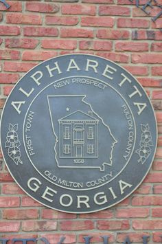 the sign on the side of a brick building that says,'alphabetia new project georgia '