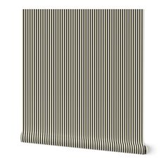 a black and white striped wallpaper with vertical stripes on the bottom half of it