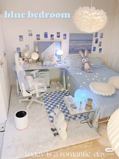 a bedroom with blue and white decor on the walls, bed in the middle, desk at the end