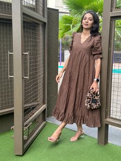 This earthy brown midi dress exudes elegance with its ruffles hemline and puffed sleeves. The V-neckline adds a touch of sophistication, while the tiered design ensures a graceful flow. Perfect for an understand yet stylish look, it's versatile for both casual and semi-formal occasions. Please provide your phone number in the Note at checkout so the courier can get in touch with you if needed. SIZE XS bust: fits bust around 32" / 81cm Waist: fits waist around 26" / 66cm SIZE S bust: fits bust ar Midi Dress Brown, Cotton Dresses Summer, Brown Midi Dress, Dress Flowy, Cotton Midi Dress, Dresses Summer, Dress Gift, Flowy Dress, Dress Clothes For Women