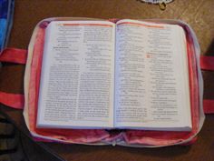 an open book sitting on top of a table