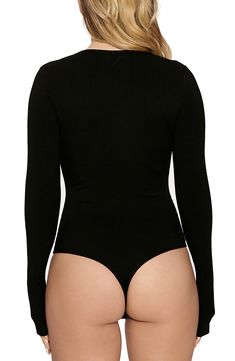 A low scoop neck adds captivating allure to a thong bodysuit with a curve-hugging fit in stretch jersey. Style Name:Naked Wardrobe Deep-V Long Sleeve Bodysuit. Style Number: 6114810. Bodycon Elastane Bodysuit For Club, Sleek High Cut Solid Bodysuit, Fitted Club Bodysuit With Lined Body, Fitted Bodysuit With Lined Body For Club, V-neck Stretch Bodysuit For Club, Stretch V-neck Bodysuit For Club, Elastane Bodycon Bodysuit For Night Out, Fitted Bodysuit With Lined Body For Night Out, Bodycon Elastane Bodysuit For Night Out