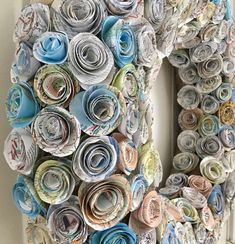 a wreath made out of rolled up papers