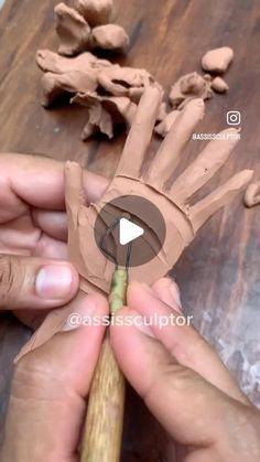 someone is making clay sculptures with their hands