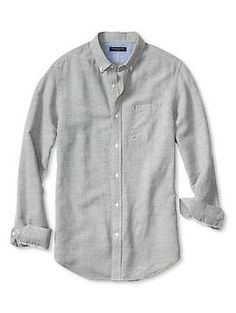 Slim-Fit Herringbone Linen/Cotton Shirt Formal Button-up Top With Pockets, Classic Gray Shirt With Spread Collar, Formal Shirt With Spread Collar And Pockets, Spring Shirt With Fold Down Collar And Pockets, Spring Shirt With Pockets And Fold Down Collar, Gray Button-up Shirt For Work, Formal Button-up Shirt With Pockets, Gray Shirt With Pockets For Spring, Business Tops With Pockets And Spread Collar