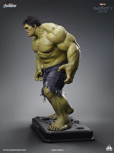 the incredible hulk statue is displayed on a black base and has an inscription that reads,