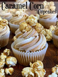 cupcakes with white frosting and caramel sprinkles on top