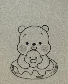 a drawing of a teddy bear holding a baby