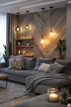 a living room filled with furniture and candles