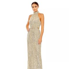 This Stunning Mac Duggal Dress Is The Perfect Choice For Any Formal Occasion. The Halter Neck And Sleeveless Design Give It An Elegant Touch, While The Sequin Accents Add A Touch Of Glamour. The Dress Is A Size 14 And Features A Zip Closure, Making It Easy To Wear.The Long Sheath Style Dress Is Perfect For Weddings, Parties, Or Cocktail Events. The Belted Waist Accentuates Your Curves, While The Soft Tie Adds A Touch Of Elegance. The Dress Is Made From High-Quality Materials And Is Sure To Last Mac Duggal Dress, Champagne Gold Color, Mac Duggal Dresses, Cocktail Event, Mac Duggal, Dress Gown, Cream And Gold, Tie Dress, Style Dress