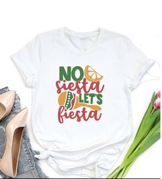 "Cinco de Mayo Shirt,No Siesta Let's Fiesta Tee,Mexican Festival Gift,Taco Tuesday Clothing,Shirt For Women,Sombrero Tshirt,Party Outfits 🎁 Enjoy your shopping ! Need custom made shirts? Don't hesitate to message us! Thanks for your support! CustomShirtsZone_ Family ✨There are all sizes in the dropdown menu. These designs are for both kids and adults. Please make sure you purchased the correct size. ----- How To Order ----- 1-) Please, check and review all the photos. 2-) Choose your t-shirt si Taco Tuesday Outfit, Mexican Maracas, Tuesday Outfit, Outfit Fiesta, Mexican Festival, Mexican T Shirts, Fiesta Shirt, Fiesta Outfit, Custom Made Shirts