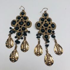 Nwot Gold Tone With Black Stones Danglers Lightweight And Great Movement. Approximately 4 1/2 Inches Long Bohemian Black Teardrop Beaded Earrings, Black Bohemian Dangle Jewelry, Bohemian Adjustable Chandelier Earrings For Parties, Bohemian Black Dangle Jewelry, Adjustable Bohemian Chandelier Earrings For Party, Black Metal Chandelier Earrings For Party, Festival Black Beaded Chandelier Earrings, Black Dangle Jewelry For Festivals, Black Dangle Jewelry For Festival