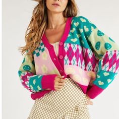 Smiley Faces, Hearts, Flowers And Argyle In This Cute Colorful Button Front Cardigan Sweater. Oversized Fit. 100% Acrylic.