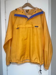 Vintage 03' Patagonia Mens Anorak Hooded Packable Windbreaker M Yellow. Great condition! It is a medium , but I usually wear large and it fits me perfect. Vans Yellow, Lubbock Tx, Patagonia, Mens Jackets, Bathing Beauties, Jackets & Coats, Mens Outfits, Music Clothes, Yellow