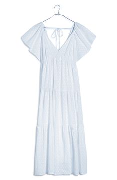 This ever-enchanting cotton maxi is designed with fluttering sleeves and a flouncy tiered skirt. 50" length (size 8) Adjustable back tie closure V-neck Short sleeves Lined 100% cotton Machine wash, tumble dry Imported Tiered Cotton Maxi Dress With Ruffle Hem, Ruffle Sleeve Maxi Dress For Daywear, Cotton V-neck Maxi Dress With Ruffle Hem, Spring Cotton Tiered Maxi Dress, Cotton Tiered V-neck Dress With Ruffle Hem, Cotton V-neck Tiered Dress With Ruffles, Cotton Maxi, Sleeve Maxi Dress, Tier Skirt