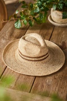 For beach days or garden chores, this wide-brimmed woven raffia hat offers style and functionality. An interior ribbon lets you adjust the snugness for a custom fit. Photo Styles, Gardening Hat, Raffia Hat, Florida Style, Rancher Hat, Brown Fits, Woven Raffia, Easter Shopping, Hand Poured Candle