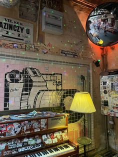 a room filled with lots of different types of musical instruments and decorations on the wall