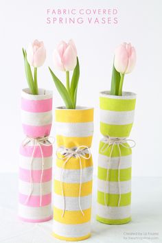 three striped vases with tulips in them and the words fabric covered spring vases