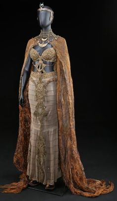 a mannequin dressed in an elaborate dress