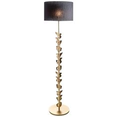 a floor lamp with a black shade on it