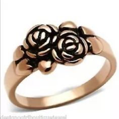 Antique Rose Gold Flower Ring Dainty This Rose Gold Plated Women's Ring Is So Cute. It Has Two Roses Placed Next To Each Other In The Rings Center Which Really Pop .....With The Black Undertones And With The Seasons Hottest Color........Rose Gold! Great Also As A "Pinky" Ring Anniversary Flower Ring With Rose Design, Rose Gold Flower Ring For Valentine's Day, Rose Gold Flower Ring, Two Roses, Sterling Silver Cz Rings, Wholesale Roses, Gold Flower Ring, Rose Gold Flower, Cz Rings Engagement