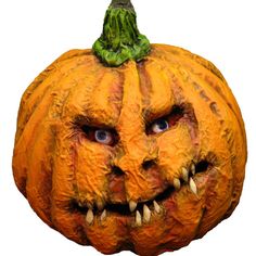 an orange pumpkin with large teeth and big eyes