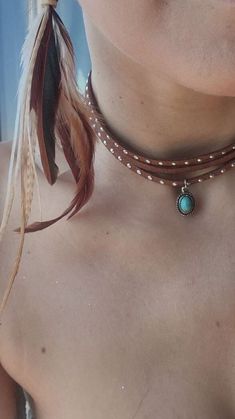 Elevate your boho-chic style with my handcrafted Turquoise Pendant Suede Choker by JustaBohoGypsy. Velvety suede with gleaming silver studs, this necklace showcases a vibrant turquoise pendant - a symbol of tranquility and wisdom. Perfect for those who cherish individuality and authenticity, this piece effortlessly enhances both casual and dressy outfits. Crafted with care and passion, it's a tribute to timeless elegance in an era of fast fashion. Embrace the bohemian spirit and make a statement that's uniquely you. Elegante Outfits, Studded Choker, Bohemian Chic Jewelry, Turquoise Charm, Chic Jewelry, Dressy Outfits, Turquoise Pendant, Bohemian Chic, Boho Chic Fashion