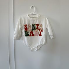 Santa Baby Long Sleeve Onesie Never Worn Very Nice And Thick Material Size 6m Christmas Baby Onesie, Baby Sweater, Santa Baby, Long Sleeve Onesie, Baby Sweaters, Baby Long Sleeve, Cricut Ideas, Onesies, Red White