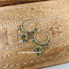 Multicolor Polki Small pearl jhumki Hoop earrings. Colorful Traditional Earrings, Bohemian Round Chandbalis, Multicolor Chandbalis For Pierced Ears, Traditional Small Hoop Multicolor Earrings, Traditional Multicolor Small Hoop Earrings, Colorful Bohemian Hoop Earrings For Party, Multicolor Chandbali Jhumkas For Pierced Ears, Multicolor Round Hoop Earrings For Festivals, Multicolor Hoop Earrings For Festivals