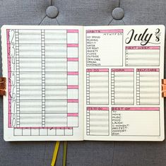 an open planner with pink and white stripes