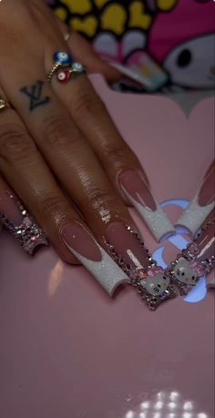 Blinged Out Almond Nails, Hello Kitty Rhinestone Nails, Cute Long Square Nails, Hello Kitty Bling Nails, Nails With Rhinestones And Charms, Nail Set Up, Cute Bling Nails, Bling Long Nails, Money Nails Acrylic