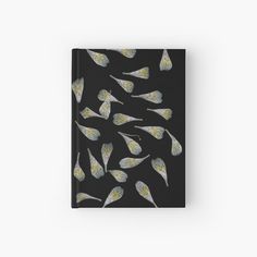 a black book with yellow and white butterflies on it hardcover notebook cover front side view