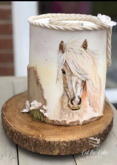 a cake with a horse painted on it